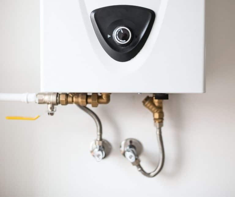 White tankless water heater on a wall