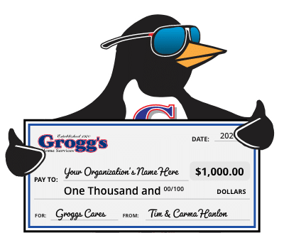 Groggs Penguin Holding Check 1 Groggs Penguin Holding Check 1