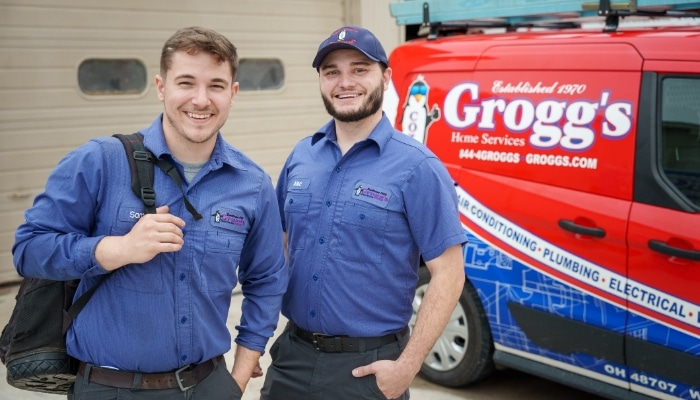 Two Groggs Technicians With Van