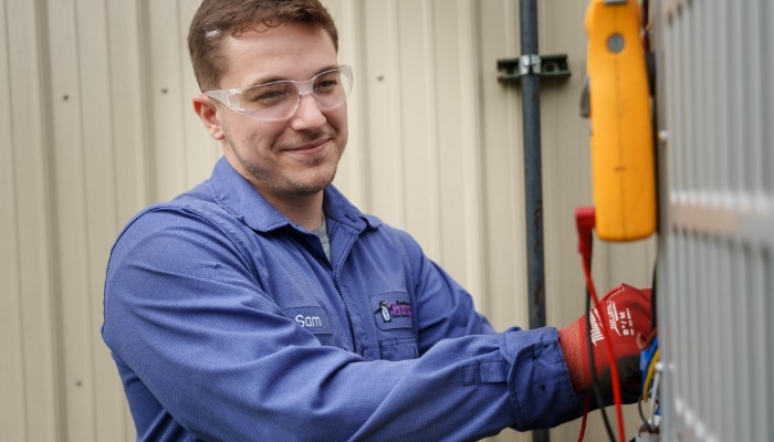 Uniformed Technician With Equipment